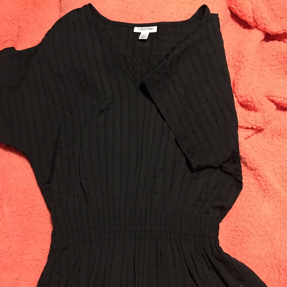 Calvin Klein sheer top.